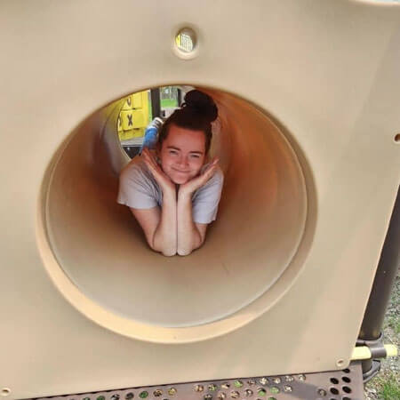 Woman on play equipment